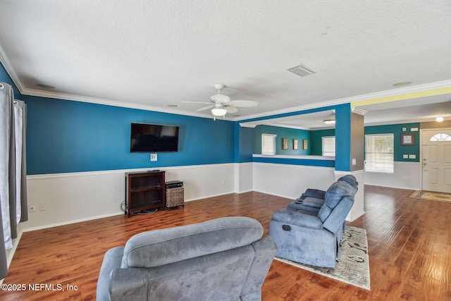 116 Nunna Rock Trl, Saint Augustine, FL 32092 - living area featuring a textured ceiling, a ceiling fan, crown molding, and wood finished floors