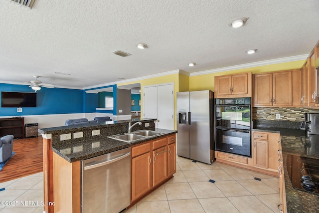 116 Nunna Rock Trl, Saint Augustine, FL 32092 - kitchen featuring black appliances, a sink, open floor plan, a ceiling fan, and ornamental molding