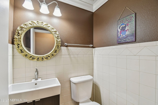 116 Nunna Rock Trl, Saint Augustine, FL 32092 - half bath with toilet, vanity, and crown molding