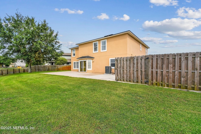 116 Nunna Rock Trl, Saint Augustine, FL 32092 - back of property featuring cooling unit, a patio area, and stucco siding