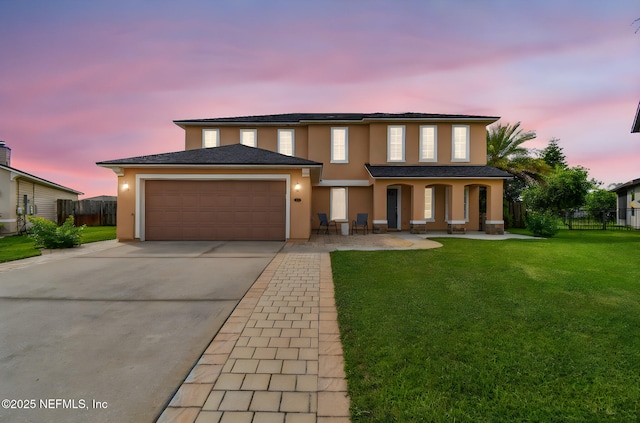 116 Nunna Rock Trl, Saint Augustine, FL 32092 - view of front of home featuring stucco siding, concrete driveway, an attached garage, and a porch