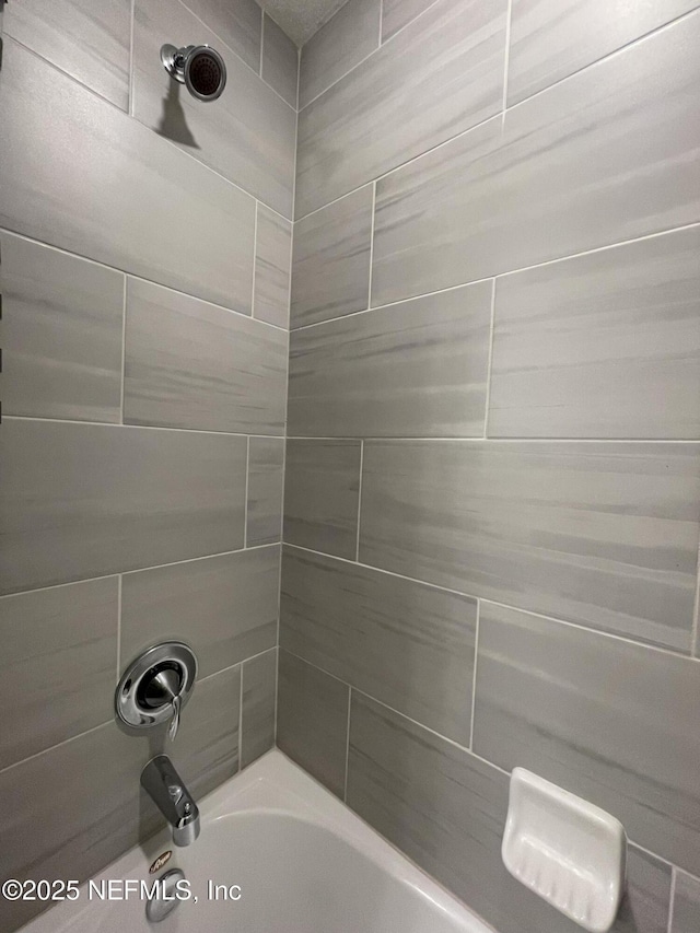 10312 Benson Lake Dr, Jacksonville, FL 32222 - bathroom featuring washtub / shower combination