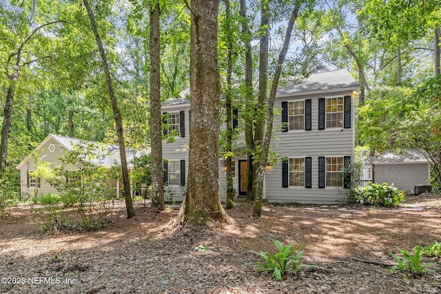 2153 Mills Rd, Jacksonville, FL 32216 - colonial-style house featuring central AC unit