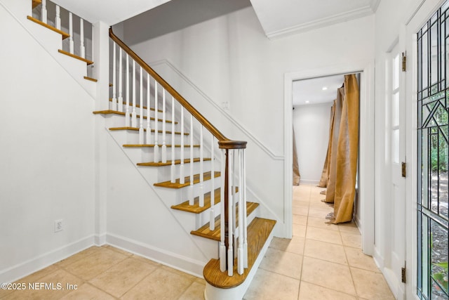 2153 Mills Rd, Jacksonville, FL 32216 - stairway featuring tile patterned flooring, baseboards, ornamental molding, and recessed lighting