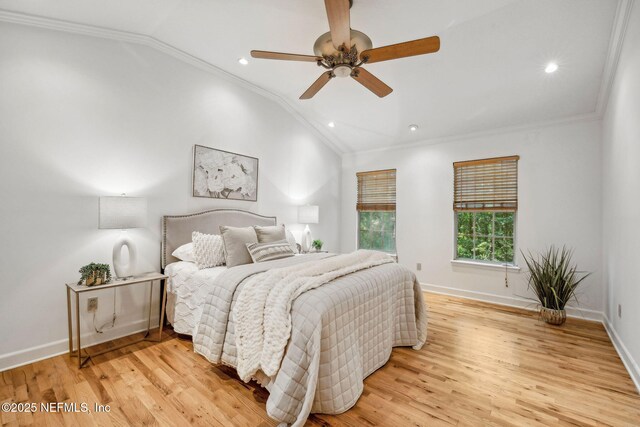 2153 Mills Rd, Jacksonville, FL 32216 - bedroom with lofted ceiling, crown molding, baseboards, light wood-type flooring, and recessed lighting
