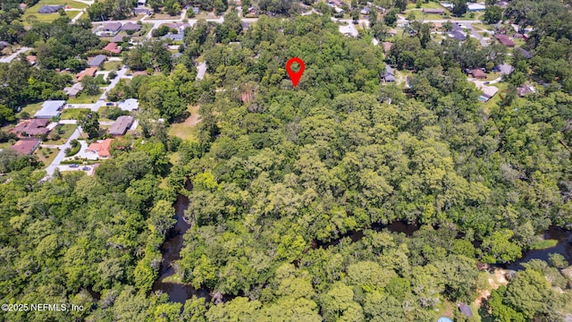 2153 Mills Rd, Jacksonville, FL 32216 - aerial view of property and surrounding area with a forest
