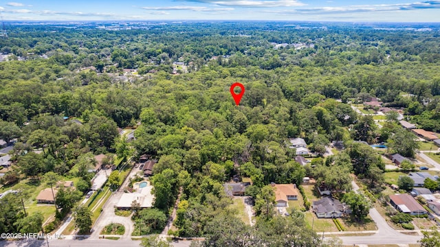 2153 Mills Rd, Jacksonville, FL 32216 - aerial view of residential area featuring a heavily wooded area