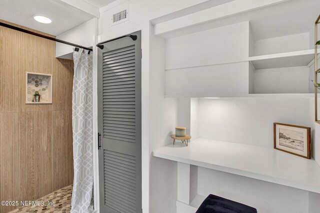 3904 Peach Dr, Jacksonville, FL 32246 - full bath featuring a shower with curtain and a closet
