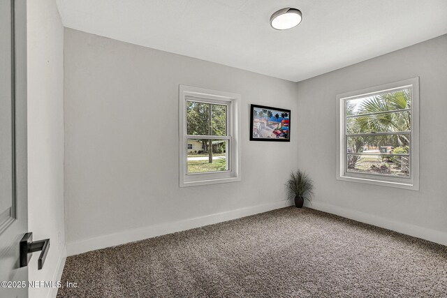 3904 Peach Dr, Jacksonville, FL 32246 - carpeted spare room with baseboards