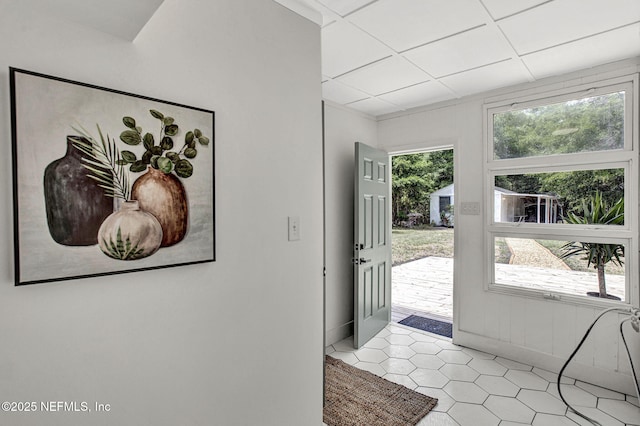 3904 Peach Dr, Jacksonville, FL 32246 - entryway featuring healthy amount of natural light and light tile patterned flooring
