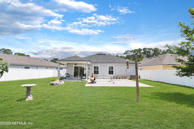 75 Codman Dr, Saint Augustine, FL 32084 - back of house featuring a patio area and stucco siding