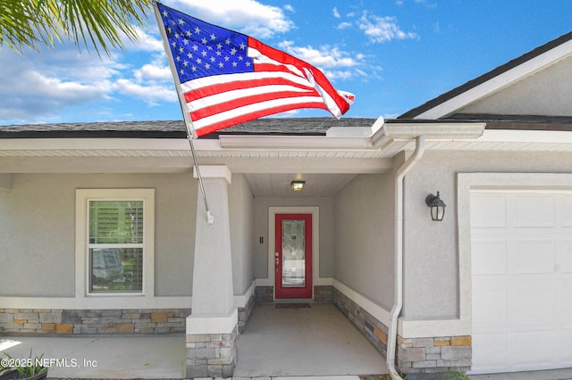 75 Codman Dr, Saint Augustine, FL 32084 - entrance to property with stone siding, stucco siding, and a garage
