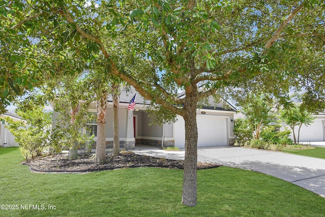 75 Codman Dr, Saint Augustine, FL 32084 - obstructed view of property featuring a front yard, a garage, and driveway