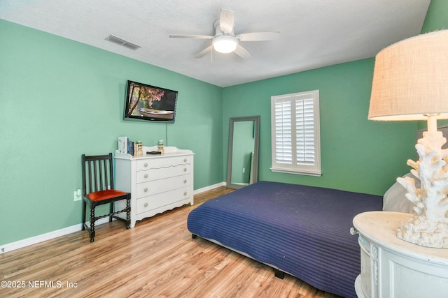 75 Codman Dr, Saint Augustine, FL 32084 - bedroom featuring wood finished floors, baseboards, and ceiling fan