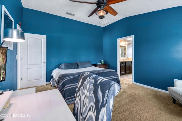 75 Codman Dr, Saint Augustine, FL 32084 - bedroom with carpet flooring, connected bathroom, baseboards, and a ceiling fan