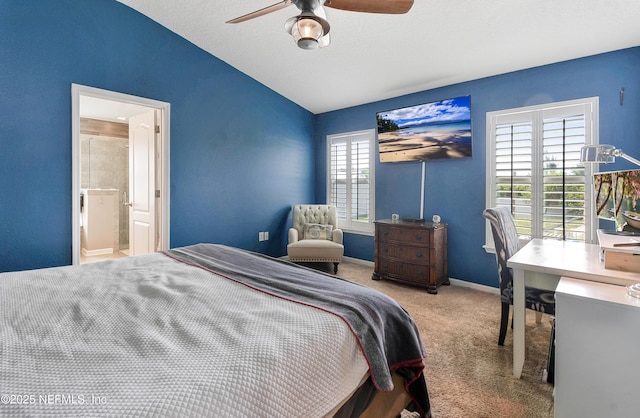 75 Codman Dr, Saint Augustine, FL 32084 - bedroom with lofted ceiling, carpet, ensuite bathroom, a desk, and baseboards