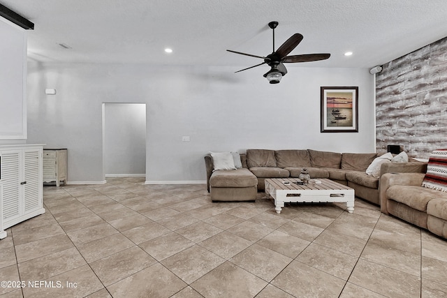 75 Codman Dr, Saint Augustine, FL 32084 - living room with a ceiling fan, light tile patterned floors, recessed lighting, and a textured ceiling