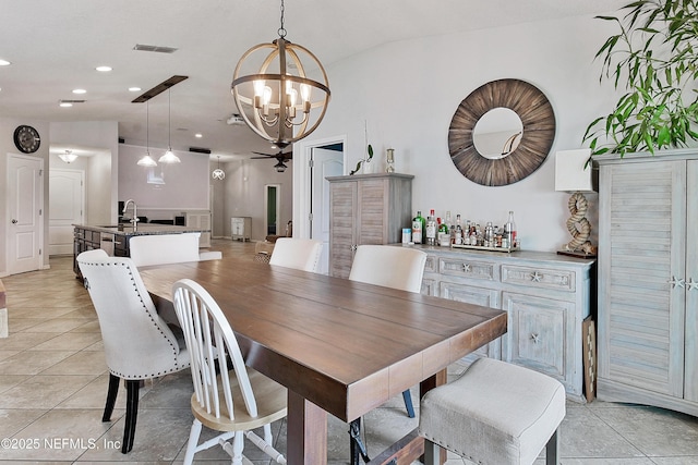 75 Codman Dr, Saint Augustine, FL 32084 - dining room featuring a chandelier, light tile patterned floors, and recessed lighting