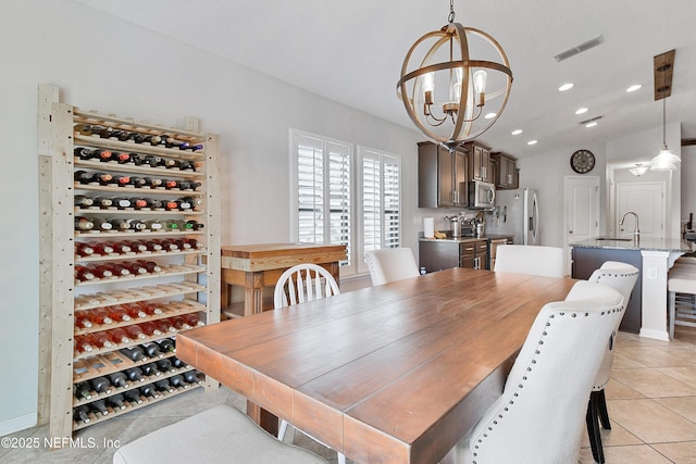 75 Codman Dr, Saint Augustine, FL 32084 - dining space featuring a chandelier, light tile patterned floors, recessed lighting, and lofted ceiling