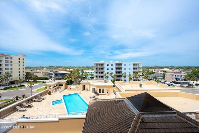 1201 1st St N Unit 1002, Jacksonville Beach, FL 32250 - community pool featuring a patio area