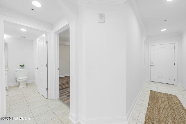 1201 1st St N Unit 1002, Jacksonville Beach, FL 32250 - corridor featuring light tile patterned flooring, recessed lighting, baseboards, and crown molding