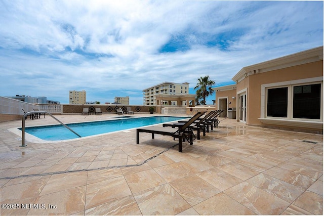 1201 1st St N Unit 1002, Jacksonville Beach, FL 32250 - community pool featuring a patio