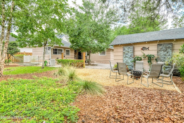 1643 Fishweir Creek Ln, Jacksonville, FL 32205 - view of yard featuring a fire pit