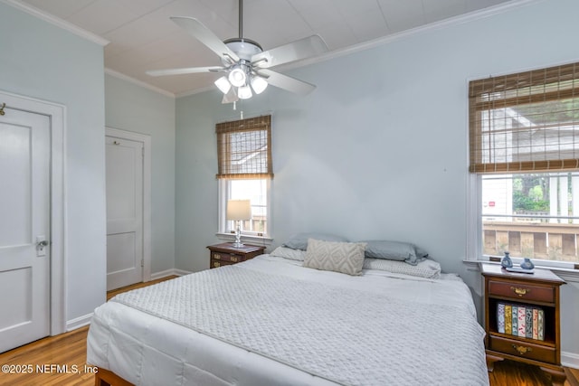 1643 Fishweir Creek Ln, Jacksonville, FL 32205 - bedroom featuring ornamental molding, wood finished floors, ceiling fan, and baseboards