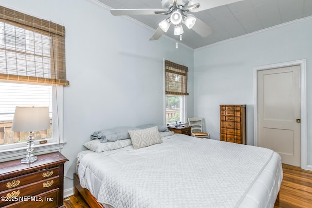 1643 Fishweir Creek Ln, Jacksonville, FL 32205 - bedroom with crown molding, wood finished floors, a ceiling fan, and baseboards