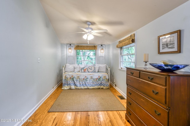1643 Fishweir Creek Ln, Jacksonville, FL 32205 - bedroom with light wood-style floors, baseboards, and a ceiling fan