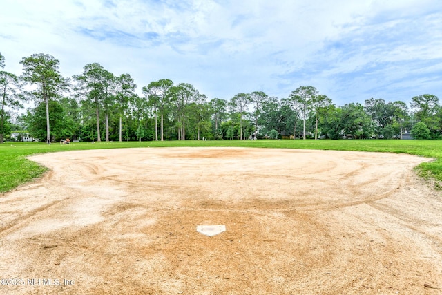 1643 Fishweir Creek Ln, Jacksonville, FL 32205 - view of home's community with view of wooded area and a lawn
