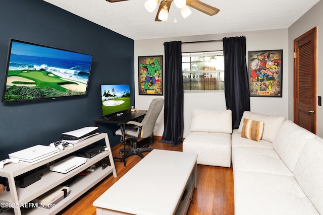 3111 Old Port Cir E, Jacksonville, FL 32216 - office area featuring a ceiling fan, wood finished floors, and a textured ceiling