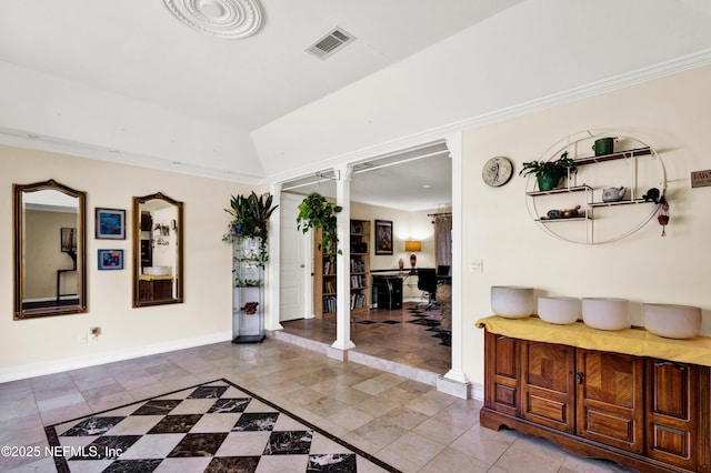 3111 Old Port Cir E, Jacksonville, FL 32216 - entrance foyer with ornate columns, tile patterned flooring, baseboards, and inlaid floor details