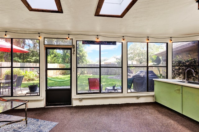 3111 Old Port Cir E, Jacksonville, FL 32216 - unfurnished sunroom featuring a skylight and a sink
