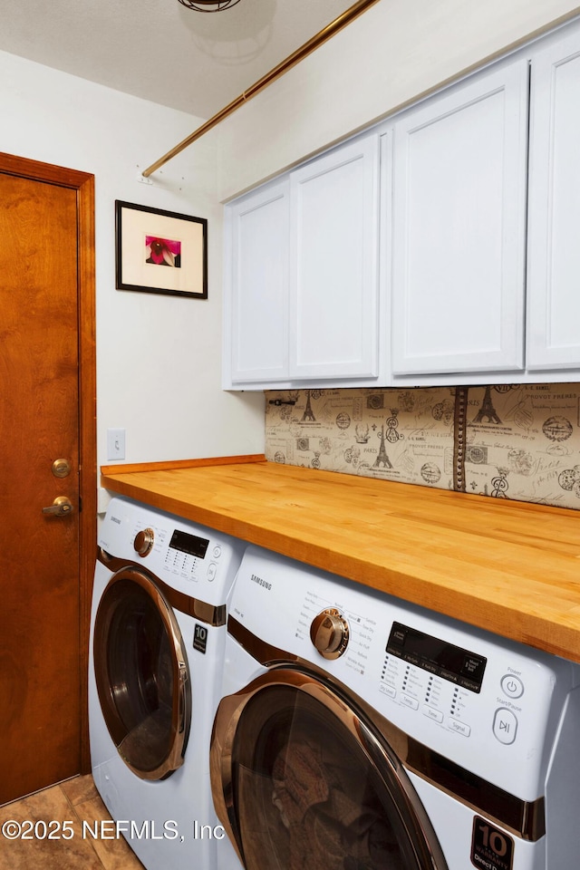 3111 Old Port Cir E, Jacksonville, FL 32216 - laundry room featuring washing machine and dryer and cabinet space