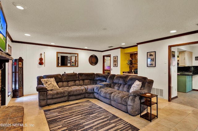3111 Old Port Cir E, Jacksonville, FL 32216 - living room with ornamental molding, recessed lighting, light tile patterned floors, and a textured ceiling