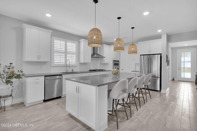45 Lantern Post Way, Ponte Vedra, FL 32081 - kitchen featuring stainless steel appliances, a sink, light wood-style flooring, white cabinets, and recessed lighting