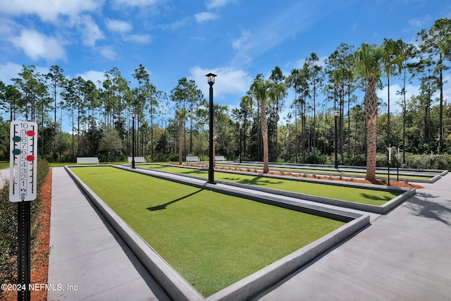 45 Lantern Post Way, Ponte Vedra, FL 32081 - view of property's community featuring a game area and view of wooded area