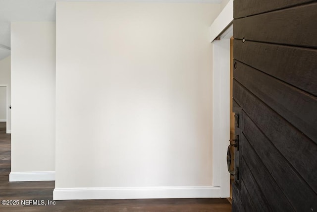2605 Spreading Oaks Ln, Jacksonville, FL 32223 - detailed view of baseboards and wood finished floors