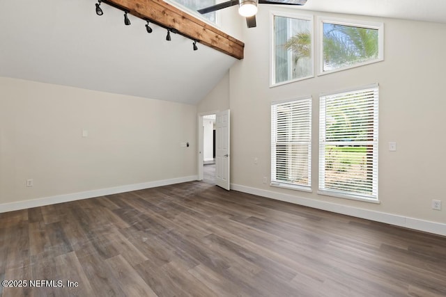 2605 Spreading Oaks Ln, Jacksonville, FL 32223 - unfurnished living room featuring rail lighting, ceiling fan, dark wood finished floors, baseboards, and high vaulted ceiling