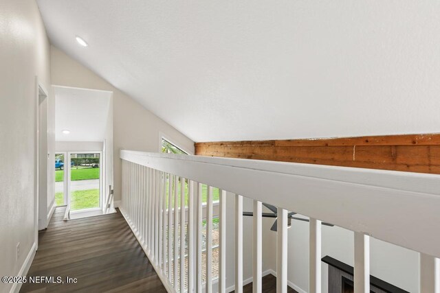 2605 Spreading Oaks Ln, Jacksonville, FL 32223 - corridor featuring lofted ceiling, baseboards, wood finished floors, and recessed lighting