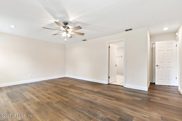 2605 Spreading Oaks Ln, Jacksonville, FL 32223 - spare room featuring ceiling fan, baseboards, wood finished floors, and recessed lighting