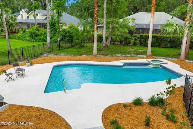 2605 Spreading Oaks Ln, Jacksonville, FL 32223 - view of swimming pool with a patio area and a pool with connected hot tub