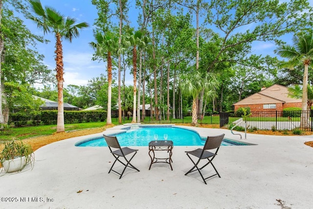 2605 Spreading Oaks Ln, Jacksonville, FL 32223 - view of swimming pool with a patio