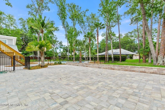 2605 Spreading Oaks Ln, Jacksonville, FL 32223 - view of community featuring a patio