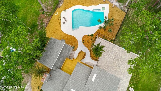 2605 Spreading Oaks Ln, Jacksonville, FL 32223 - view from above of property featuring a pool
