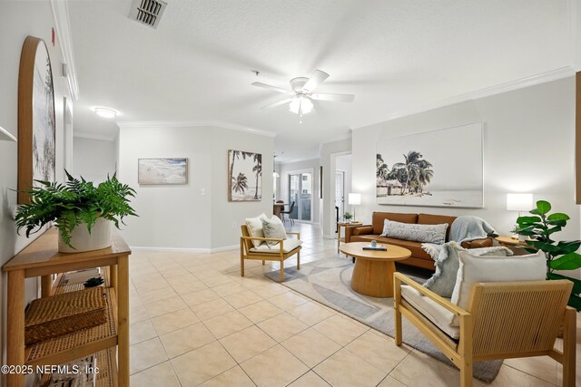 1655 The Greens Way Unit 2612, Jacksonville Beach, FL 32250 - living area with ornamental molding, a ceiling fan, light tile patterned floors, and baseboards
