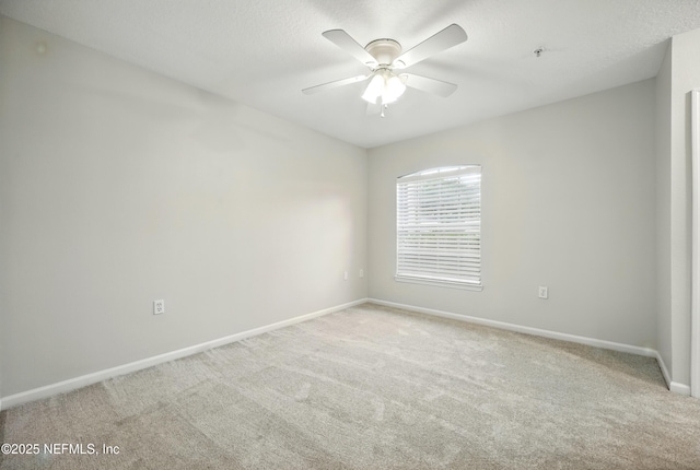 1655 The Greens Way Unit 2612, Jacksonville Beach, FL 32250 - unfurnished room featuring baseboards, light carpet, ceiling fan, and a pendent fire sprinkler