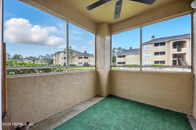 1655 The Greens Way Unit 2612, Jacksonville Beach, FL 32250 - balcony with a ceiling fan and a residential view