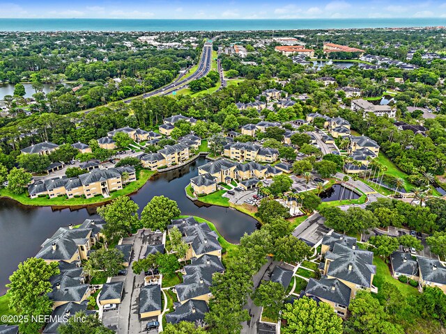 1655 The Greens Way Unit 2612, Jacksonville Beach, FL 32250 - aerial view of property's location with a large body of water and nearby suburban area